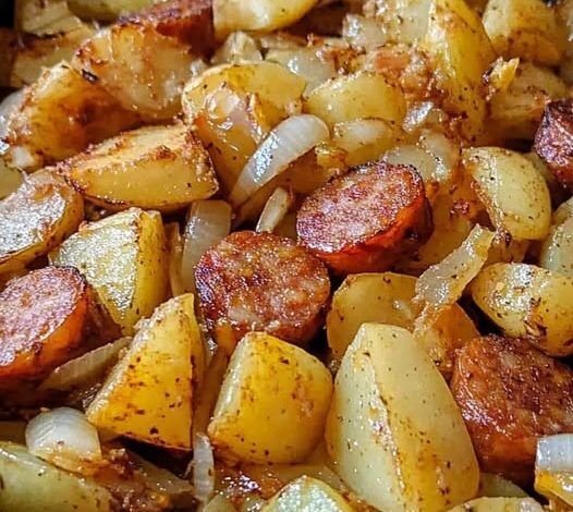 Fried Potatoes Onions And Smoked Polish Sausage