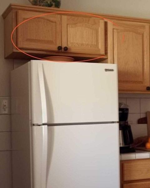 Here’s What Those Cupboards Above Your Refrigerator Are Used For